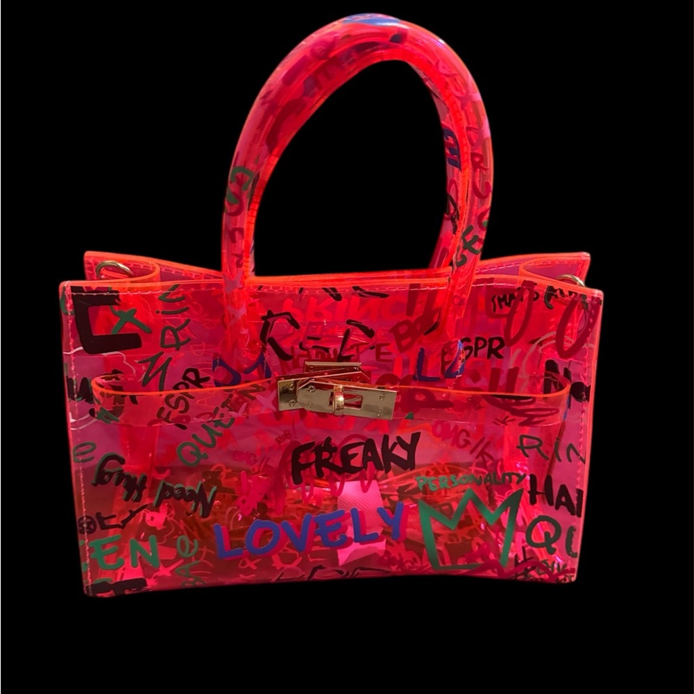 Brand New Clear Stadium Bag . Graffiti Style fits lots! Phone, wallet Etc!